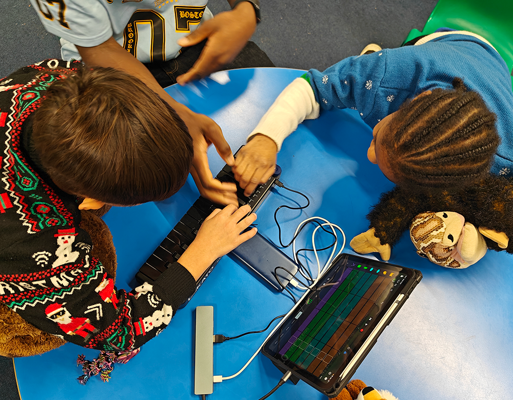 Kids play with computer